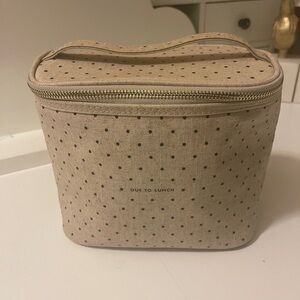 Kate spade beautiful lunchbox out to lunch in the front.with gold zipper